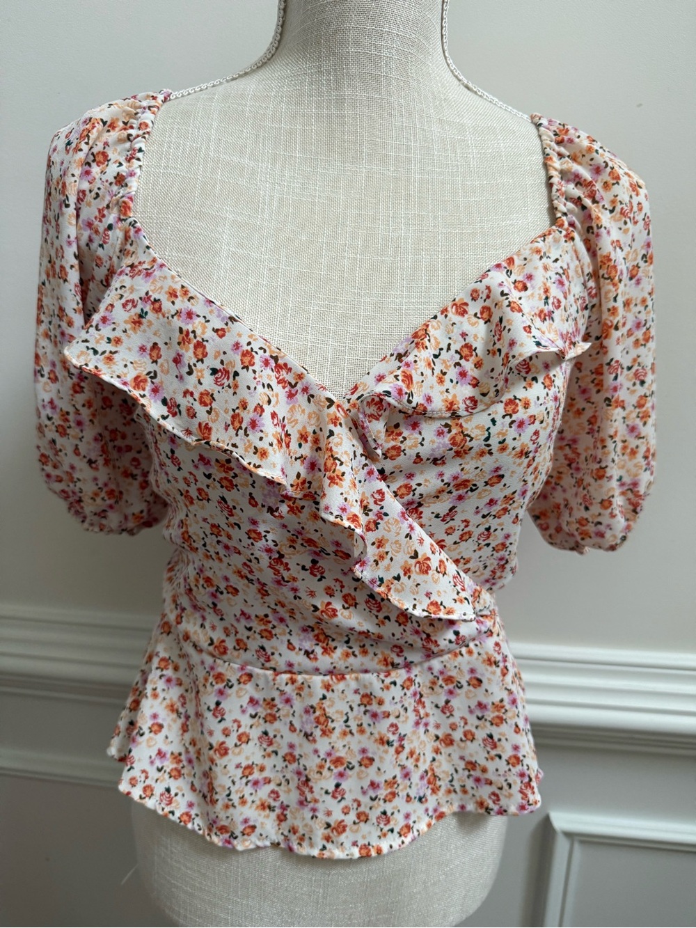 Lush White Floral Ruffle Wrap Peplum Top